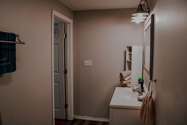 24 Elm St, Houlton, ME 04730 - bathroom featuring vanity and wood finished floors