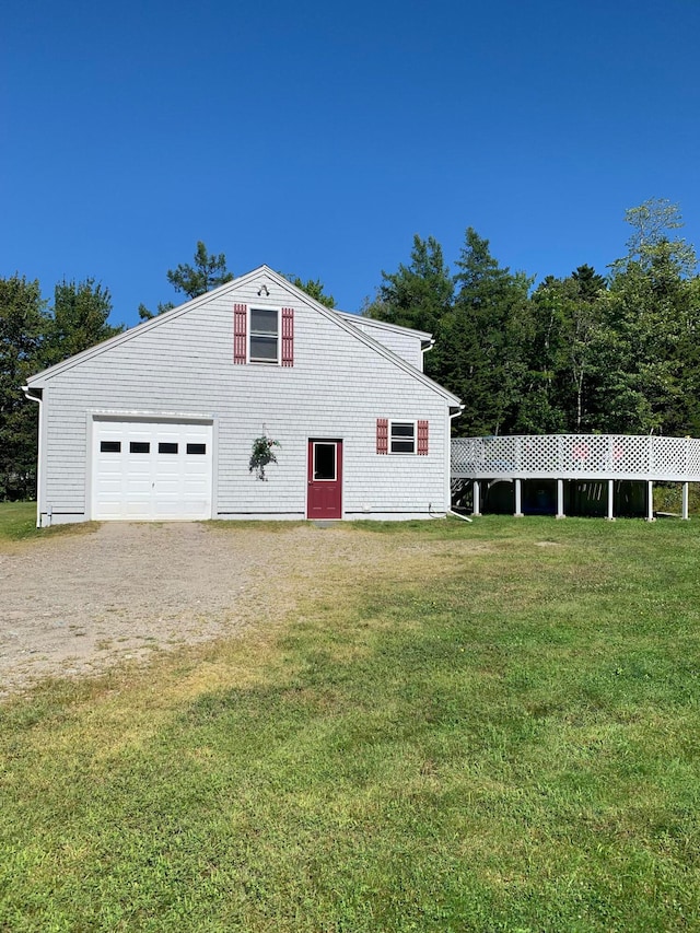 garage with a yard