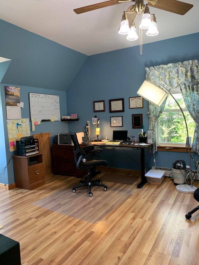 office area with wood-type flooring, lofted ceiling, and ceiling fan