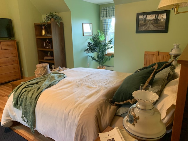 bedroom featuring hardwood / wood-style floors