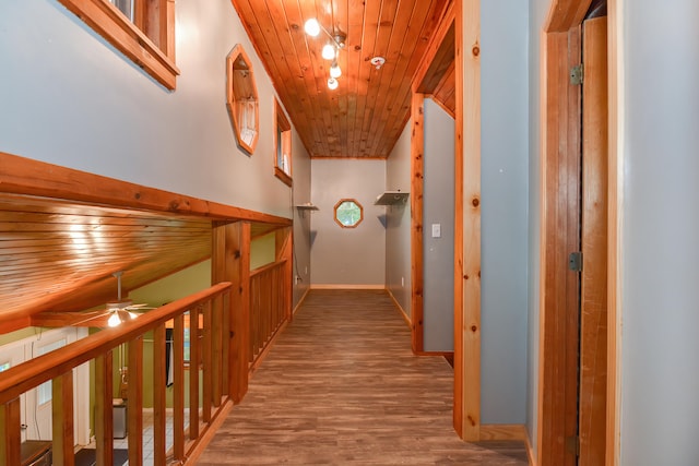 hall with hardwood / wood-style floors and wooden ceiling