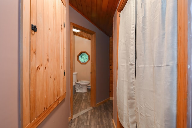 bathroom featuring crown molding, wooden ceiling, vaulted ceiling, hardwood / wood-style floors, and toilet