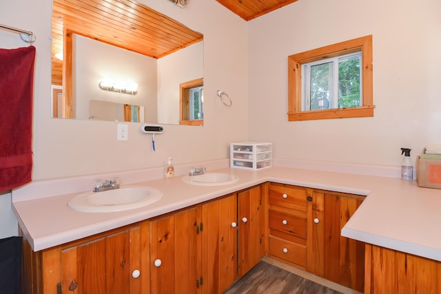 bathroom featuring wood ceiling, wood-type flooring, and vanity