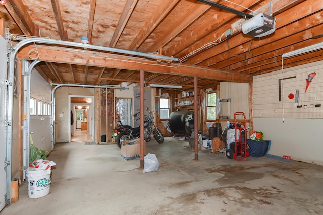 garage featuring a garage door opener