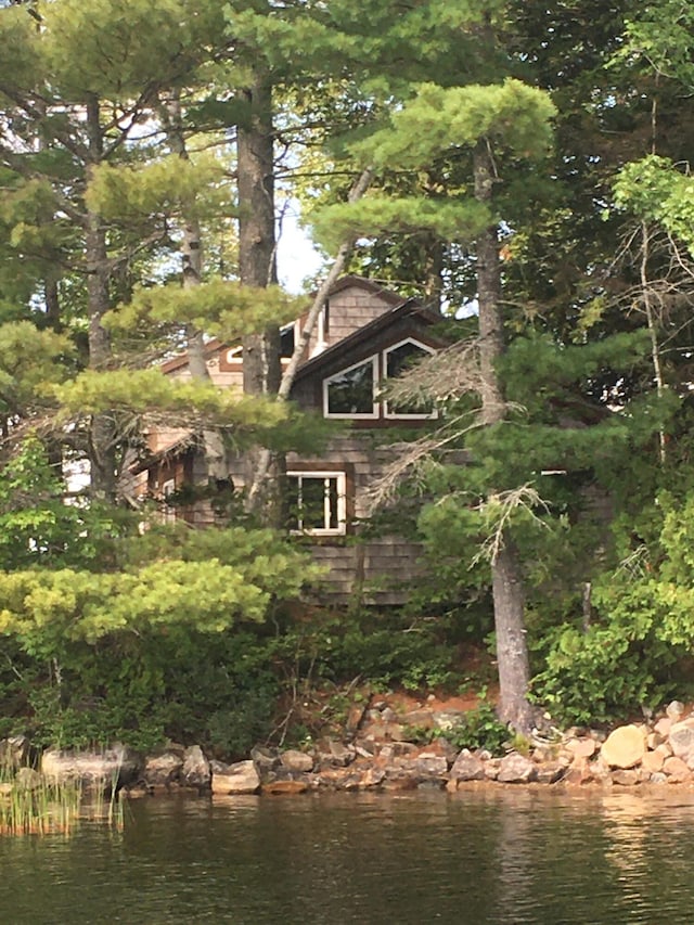 view of side of property featuring a water view