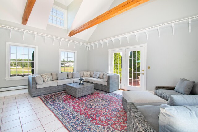 tiled living room featuring a baseboard heating unit, a healthy amount of sunlight, beamed ceiling, and french doors