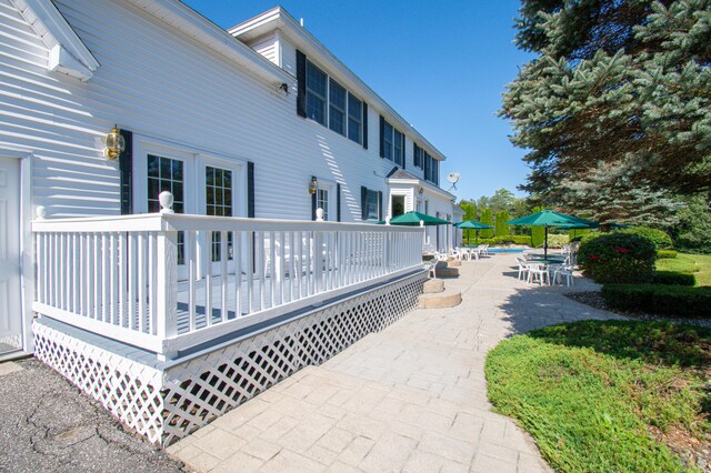 view of patio / terrace featuring a wooden deck