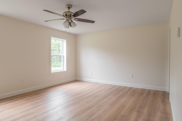 268 Merrill Rd, Levant, ME 04456 - unfurnished room with light wood-style floors, baseboards, and a ceiling fan