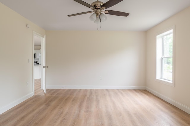 268 Merrill Rd, Levant, ME 04456 - spare room featuring light wood-style flooring, baseboards, and a ceiling fan