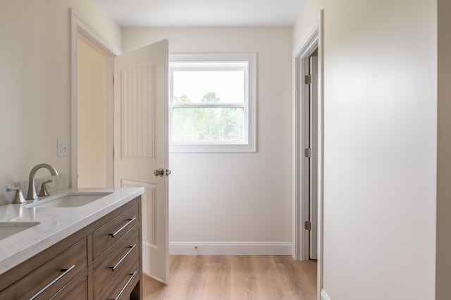 268 Merrill Rd, Levant, ME 04456 - bathroom featuring vanity, wood finished floors, and baseboards