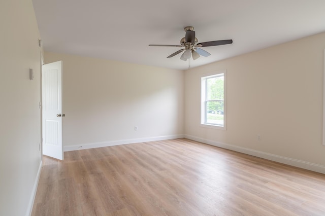 268 Merrill Rd, Levant, ME 04456 - empty room featuring light wood finished floors, a ceiling fan, and baseboards
