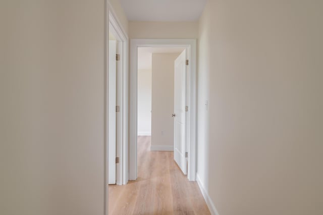 268 Merrill Rd, Levant, ME 04456 - hallway with light wood-style flooring and baseboards
