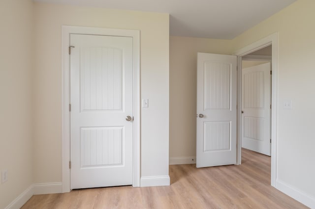 268 Merrill Rd, Levant, ME 04456 - unfurnished bedroom with light wood-style floors and baseboards