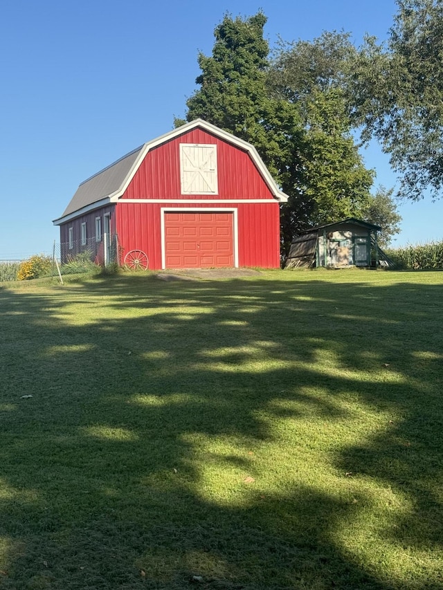 265 Main Rd, Bradford, ME 04410 - view of barn featuring a yard