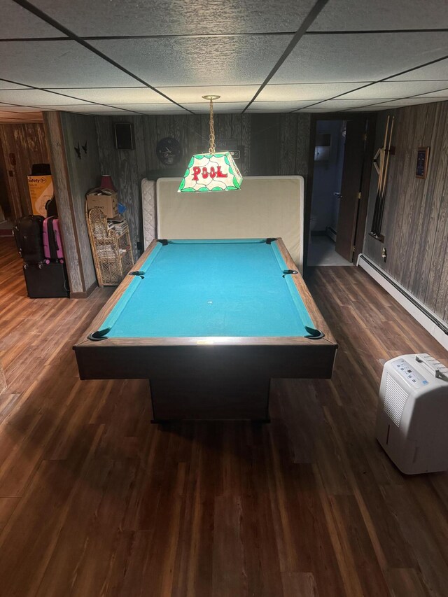 265 Main Rd, Bradford, ME 04410 - game room featuring a baseboard heating unit, wood walls, a drop ceiling, and wood finished floors