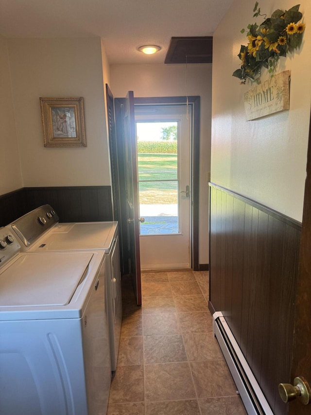 265 Main Rd, Bradford, ME 04410 - laundry room featuring baseboard heating, laundry area, wainscoting, and washing machine and clothes dryer