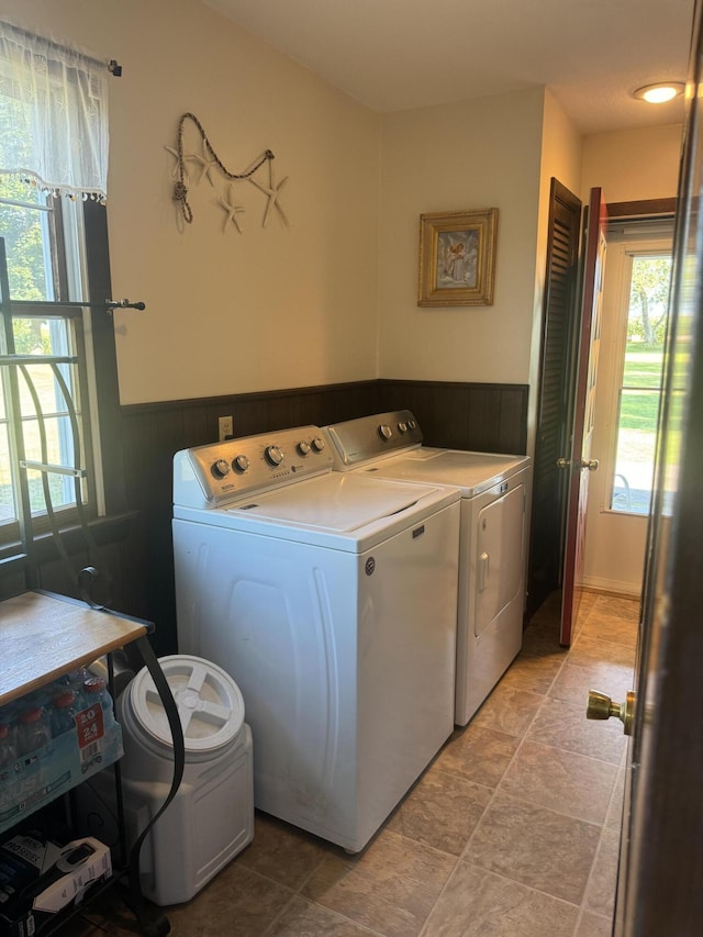 265 Main Rd, Bradford, ME 04410 - clothes washing area with washing machine and dryer, laundry area, and a wainscoted wall
