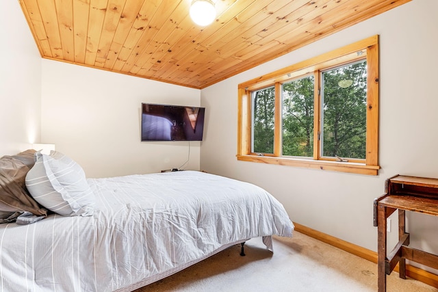 39 Simmons Ln, Friendship, ME 04547 - carpeted bedroom featuring wooden ceiling and baseboards