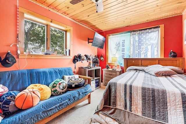 bedroom with crown molding, carpet flooring, ceiling fan, and wooden ceiling