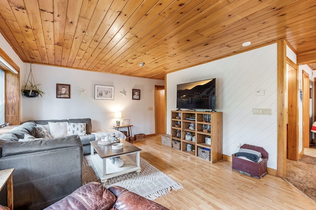 living room featuring wood ceiling, crown molding, and light hardwood / wood-style flooring