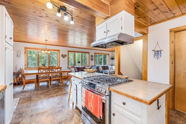 39 Simmons Ln, Friendship, ME 04547 - kitchen with stainless steel range with gas stovetop, wooden ceiling, ornamental molding, under cabinet range hood, and white cabinets