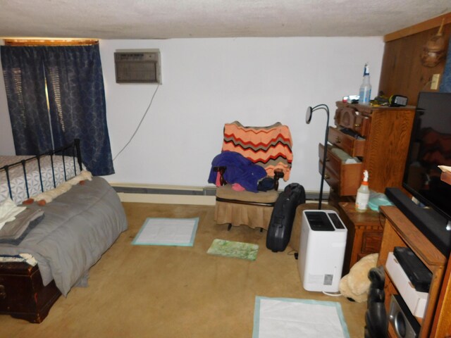 carpeted bedroom with a textured ceiling, baseboard heating, and an AC wall unit