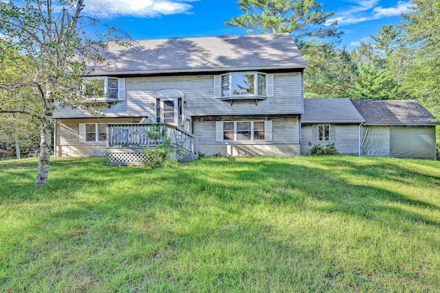 back of house with a yard