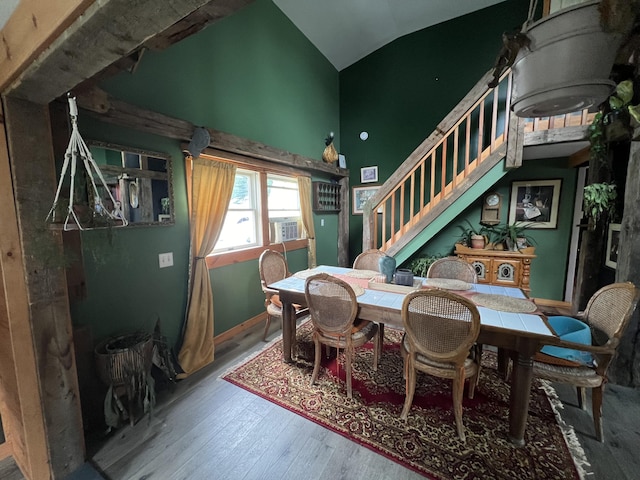 50 Hanover St, Skowhegan, ME 04976 - dining room featuring stairway, wood finished floors, and lofted ceiling