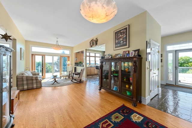 interior space featuring hardwood / wood-style floors and french doors