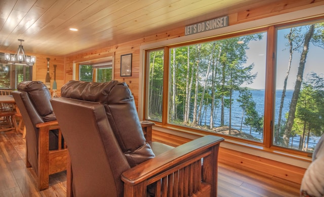 13 S Lucy Way, Greenville, ME 04441 - living room with a chandelier, wooden walls, recessed lighting, wood ceiling, and wood-type flooring