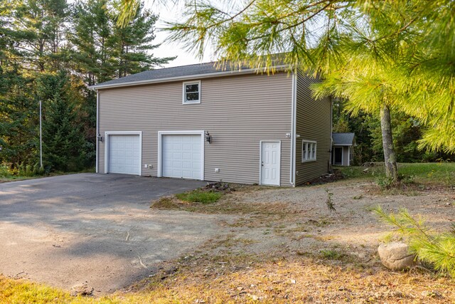 exterior space featuring a garage