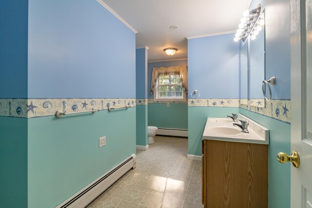 bathroom featuring vanity, a baseboard heating unit, ornamental molding, and toilet