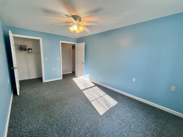 23 Millvale Rd, Bucksport, ME 04416 - unfurnished bedroom featuring baseboards, a closet, and ceiling fan