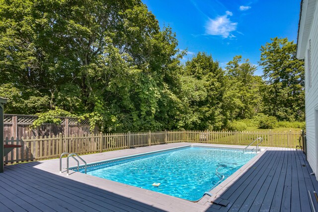 view of pool featuring a wooden deck