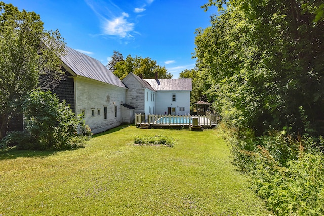 view of yard featuring a deck