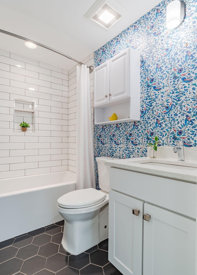 bathroom with tile patterned floors, visible vents, toilet, shower / bath combination with curtain, and vanity