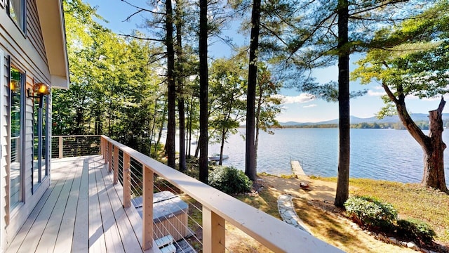 deck featuring a water and mountain view