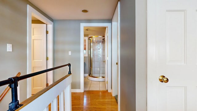 hallway featuring light hardwood / wood-style flooring