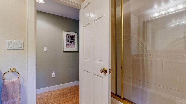 hall with light wood-type flooring