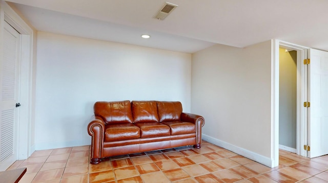 living area featuring light tile patterned floors