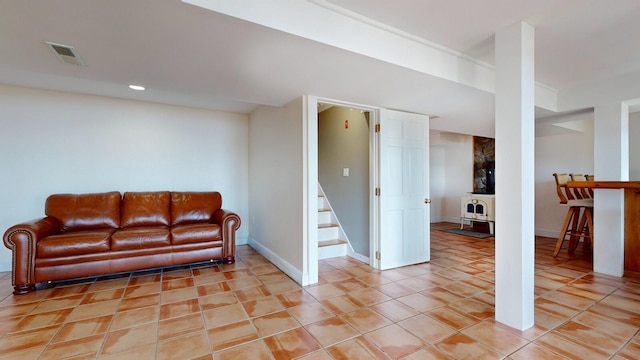 living room with light tile patterned flooring