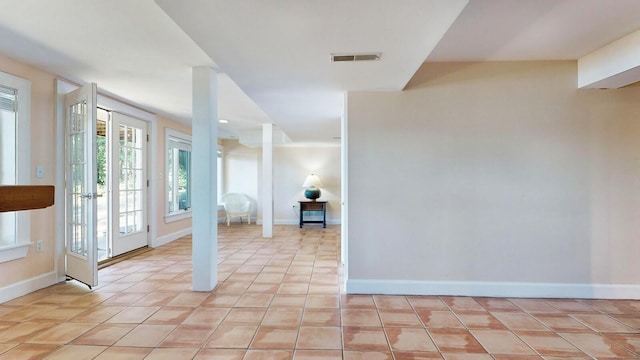 interior space with light tile patterned flooring