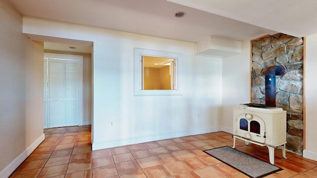 unfurnished living room with light tile patterned floors