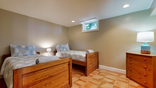 bedroom featuring light tile patterned floors