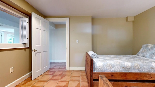 unfurnished bedroom featuring light tile patterned flooring