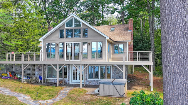 back of house with a balcony and a patio area