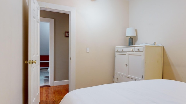 bedroom featuring light wood-type flooring