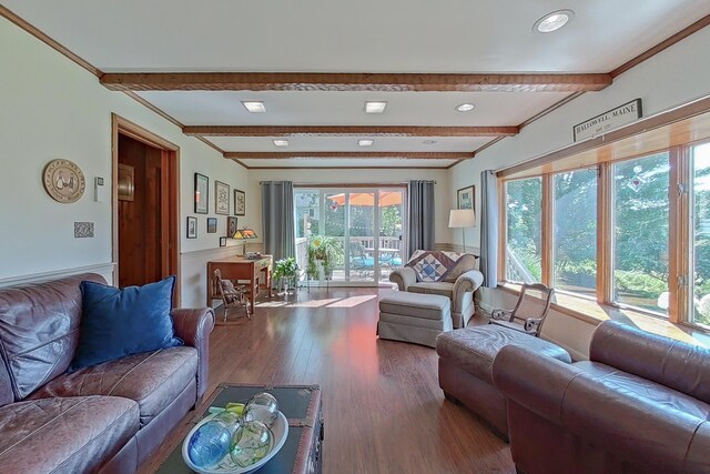 living room with hardwood / wood-style floors and beam ceiling