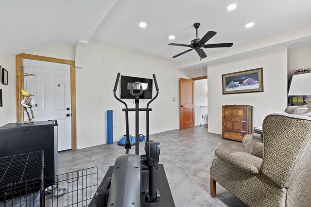 workout area with ceiling fan and concrete floors