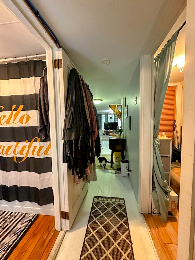 hallway featuring light hardwood / wood-style flooring